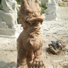 踩球麒麟雕塑，晚霞紅麒麟石雕